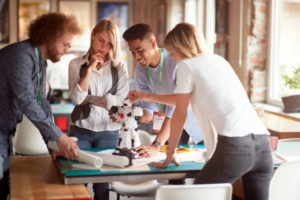 Group Young Creative People Analyzing Robot Toy Work Working Atmopshere — Stock Photo, Image