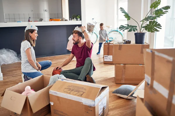 Happy Playful Family Moving New Apartment Playing Together — Stock Photo, Image
