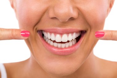 Woman showing her perfect teeth clipart