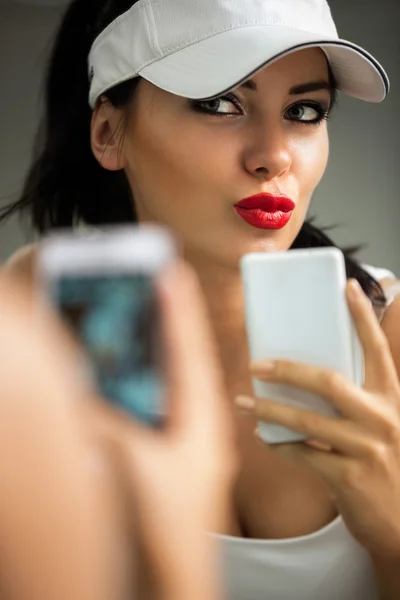 Selfie - girl making self portrait front of the mirror — Stock Photo, Image