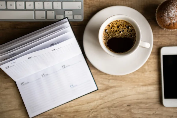 Wooden desk with office supplies — Stock Photo, Image