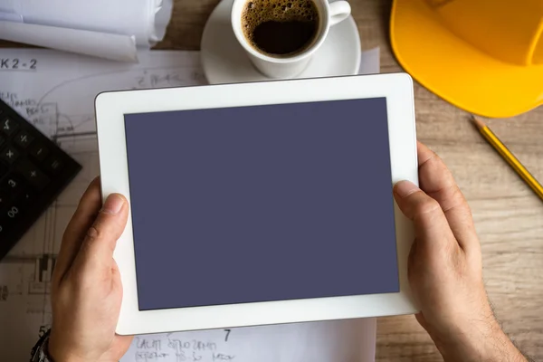 Contractor holding tablet pc — Stock Photo, Image