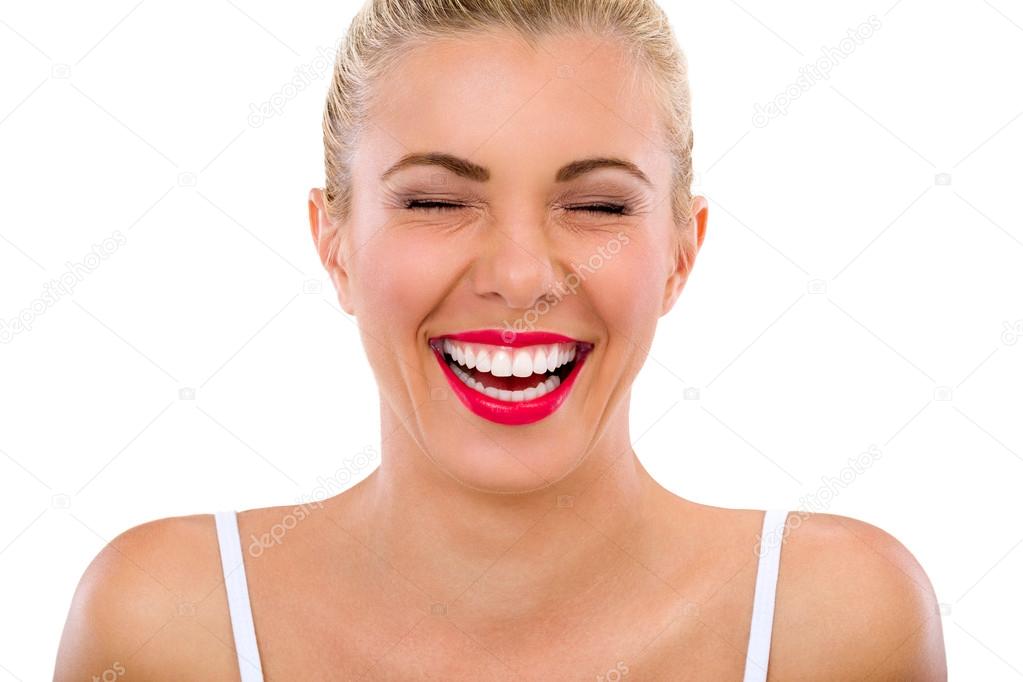 woman with beautiful teeth laughs