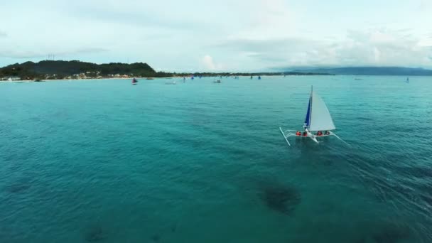 3.	Aerial flight above the ocean, spin from the sunset to the coast  -Boracay, Philippines – stockvideo