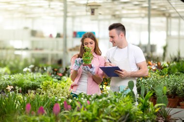 Young botanists  in greenhouse