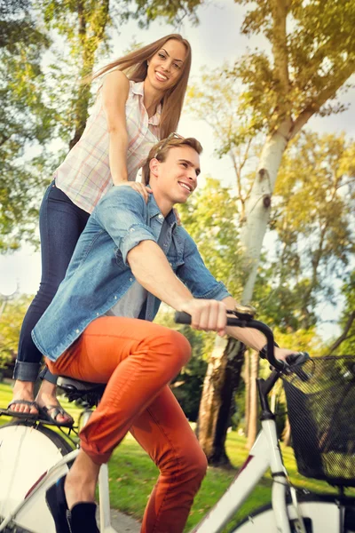 Couple on bicycle — Stock Photo, Image