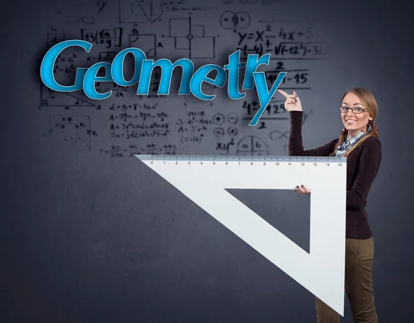 Student girl pointing at word geometry — Stock Photo, Image