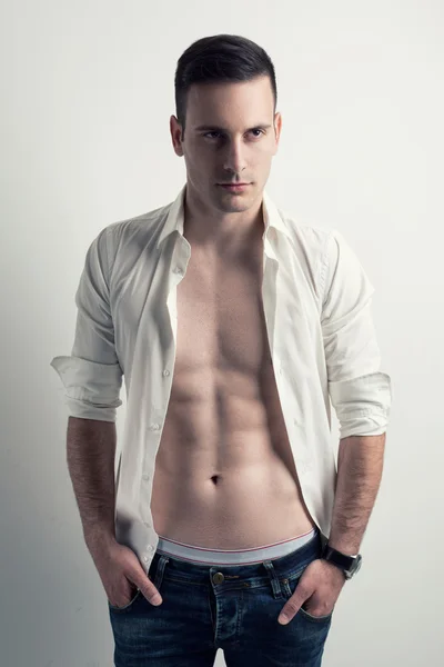 Fashion young man in white shirt — Stock Photo, Image