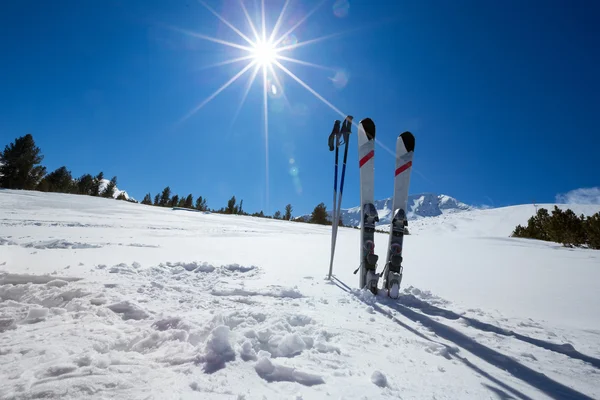 Ski equipments on ski run — Stock Photo, Image