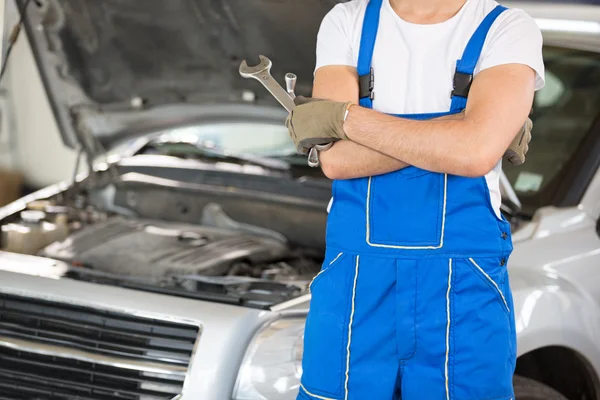 Mechanic with the tools — Stock Photo, Image