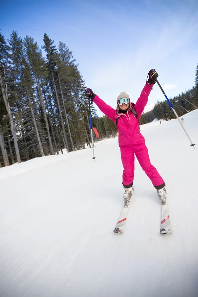 Young happy woman skier — Stock Photo, Image