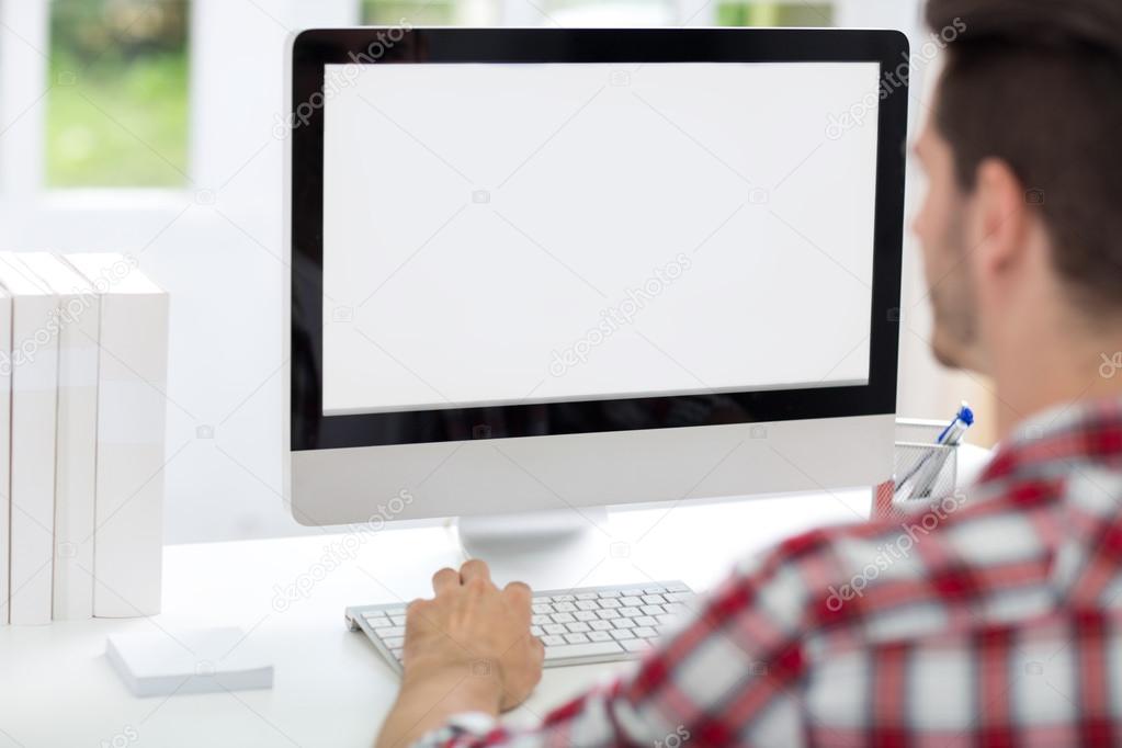 Young man front of computer