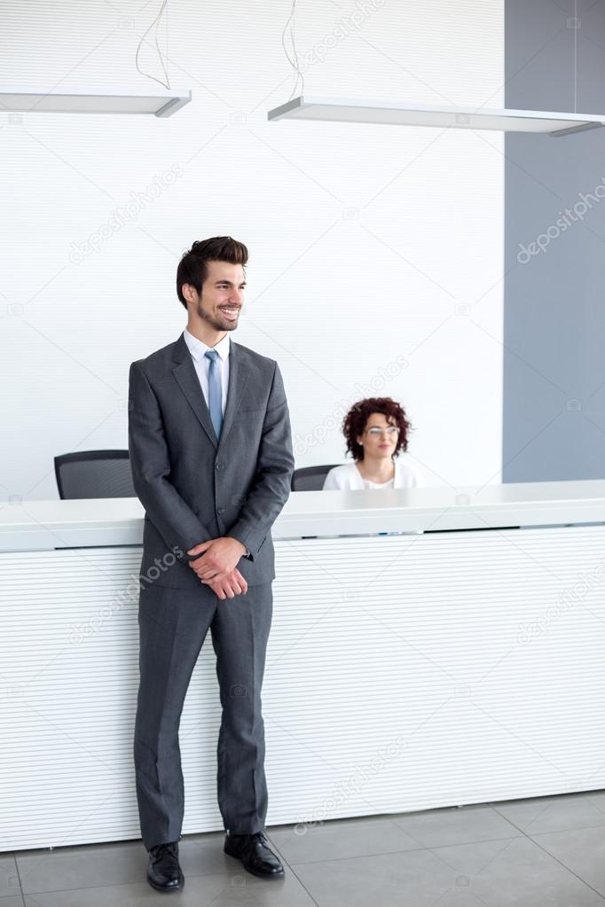 Reception guy is at service of passengers