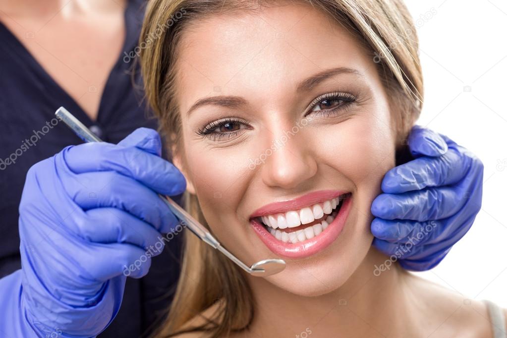 Teeth checkup at dentist — Stock Photo © luckybusiness 98533832