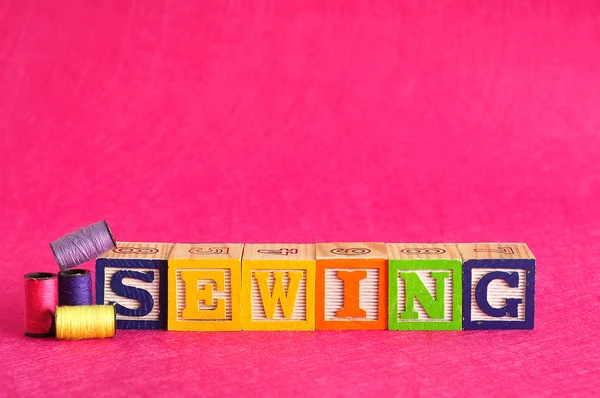 El hilo y la palabra coser — Foto de Stock