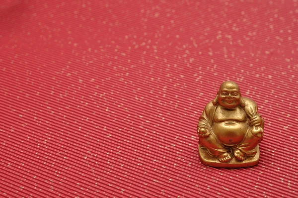 Buddhas auf rotem Hintergrund — Stockfoto