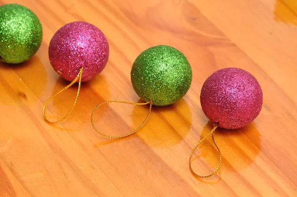 Green and pink baubles — Stock Photo, Image