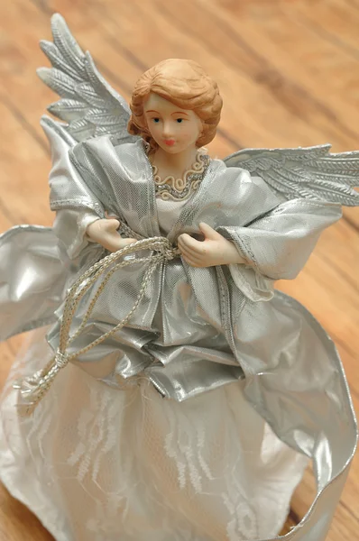 An angel dressed in silver for decorating a Christmas tree — Stock Photo, Image