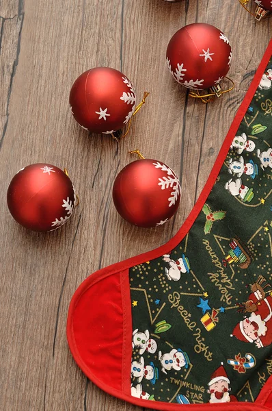 Christmas stocking and baubles — Stock Photo, Image