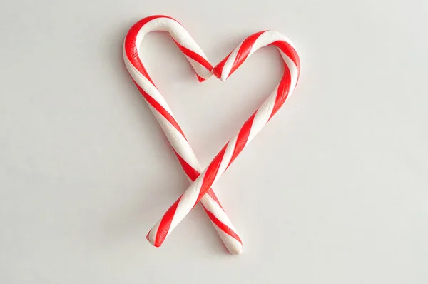 Candy canes in the shape of a heart — Stock Photo, Image