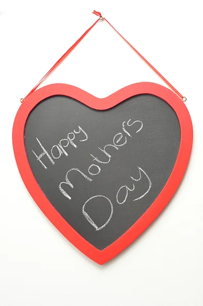 Happy mothers day written on a blackboard — Stock Photo, Image