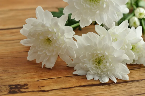 Astrofes blancos sobre fondo de madera — Foto de Stock