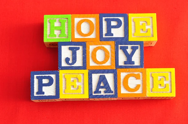 Natale, speranza e gioia ortografati con blocchi di alfabeto — Foto Stock