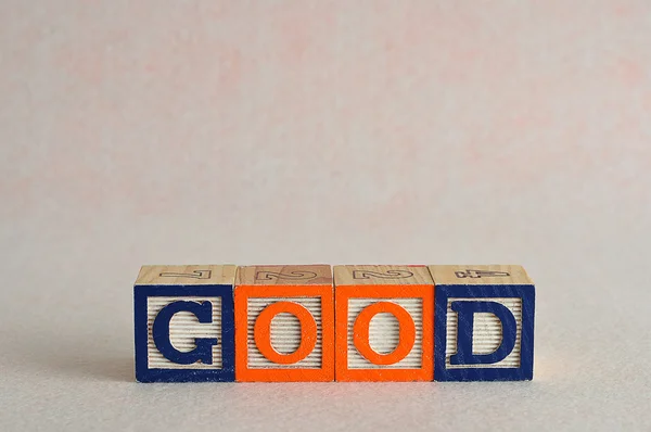 The word good spelled with colorful blocks — Stock Photo, Image