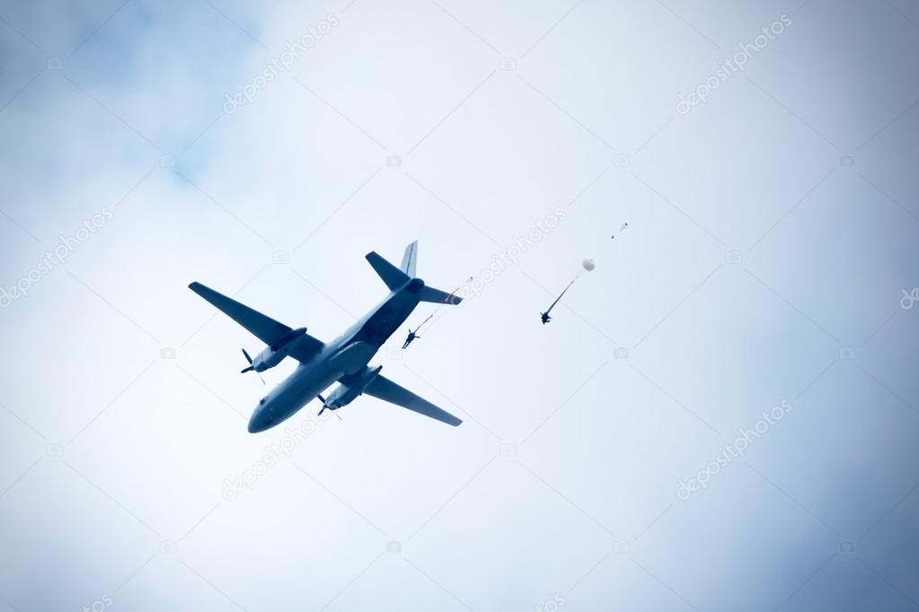 parachutists in the sky