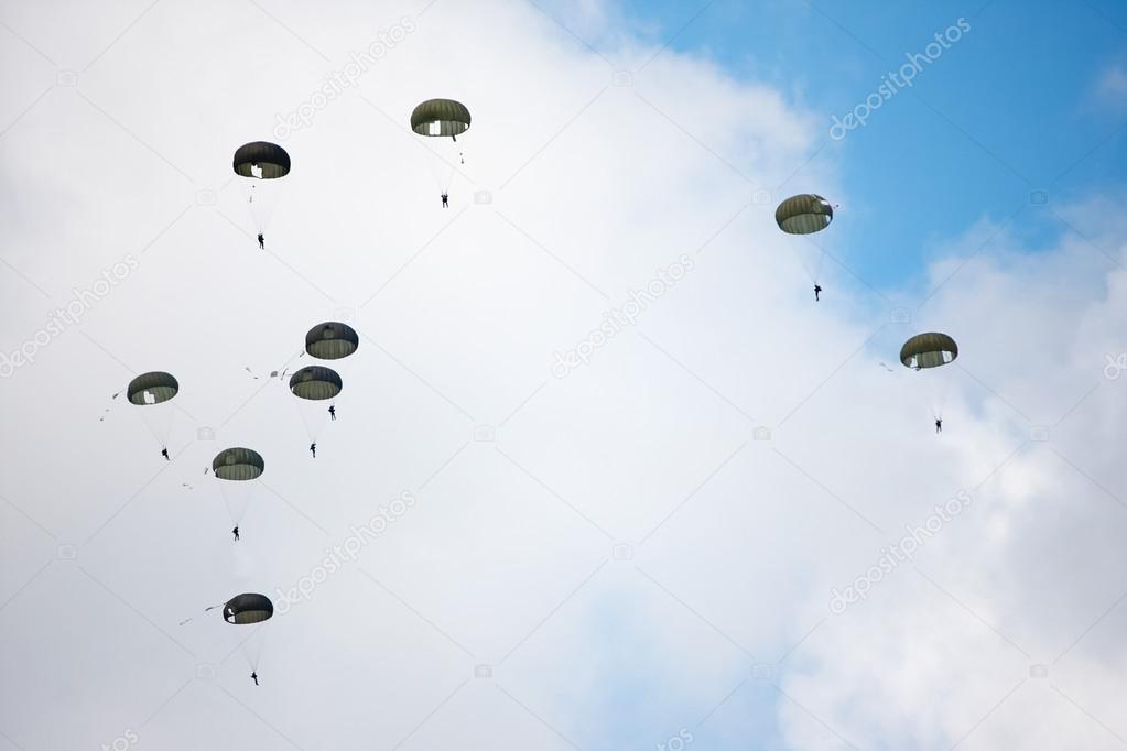 parachutists in the sky