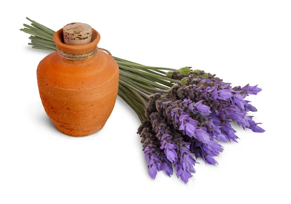 Eterisk olja och lavendel blommor — Stockfoto