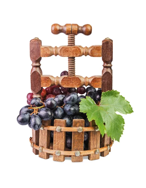 Winogron w wazonie drewniane — Zdjęcie stockowe