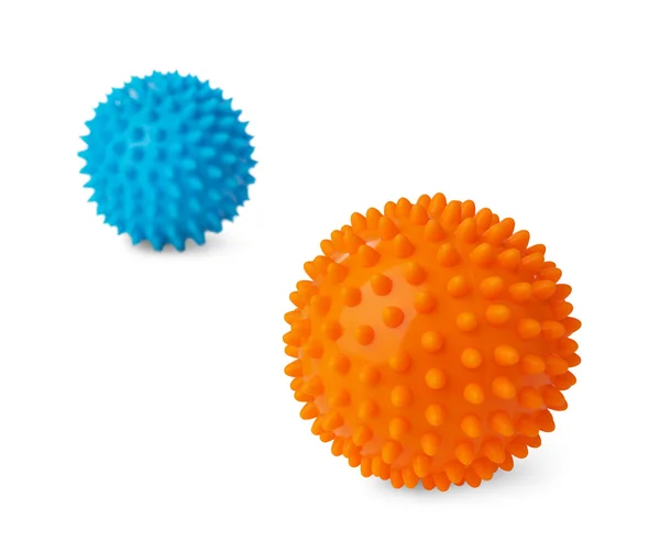 Пластиковый оранжевый и синий массаж шарики — стоковое фото