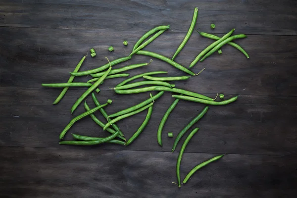 Green beans on wooden  backgroun — Stock Photo, Image