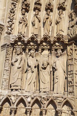 Statues to the left of the Portal of the Virgin, Notre Dame cath clipart