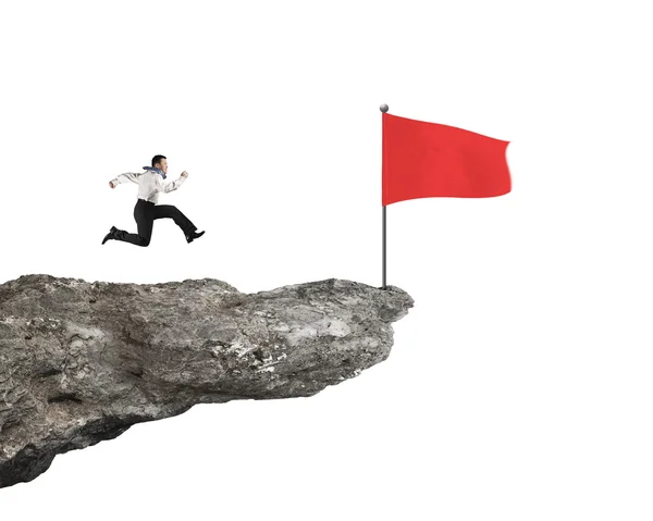 Man running on cliff for wavy flag isolated in white — Stock Photo, Image