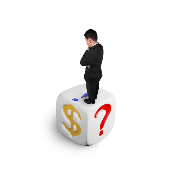 Businessman standing on dice of dollar sign — Stock Photo, Image
