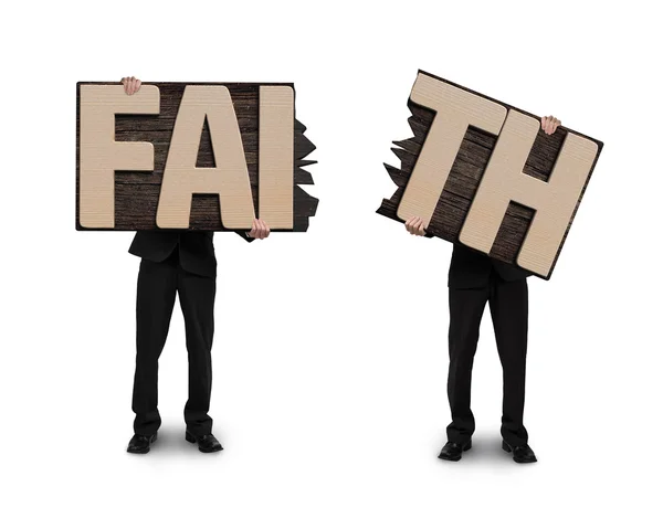 Uomini in possesso di due pannelli di legno parola FAITH incrinato . — Foto Stock