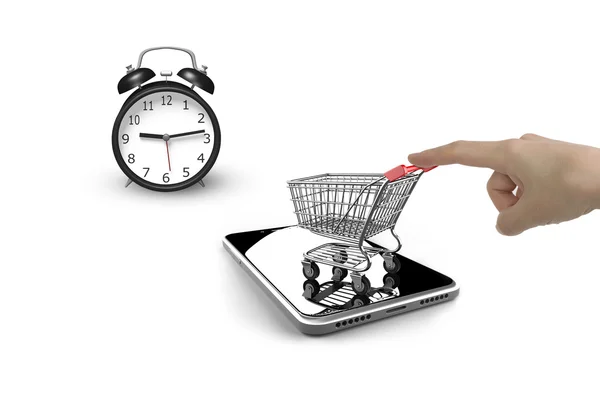 Alarm clock with forefinger pushing shopping cart on smartphone — Stock Photo, Image