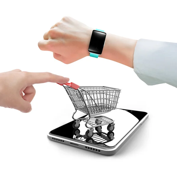 Hand wearing smartwatch with forefinger pushing shopping cart on — Stock Photo, Image