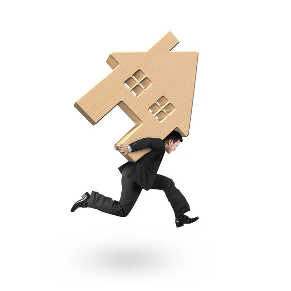 Man carrying wooden house on his back and running — Stock Photo, Image