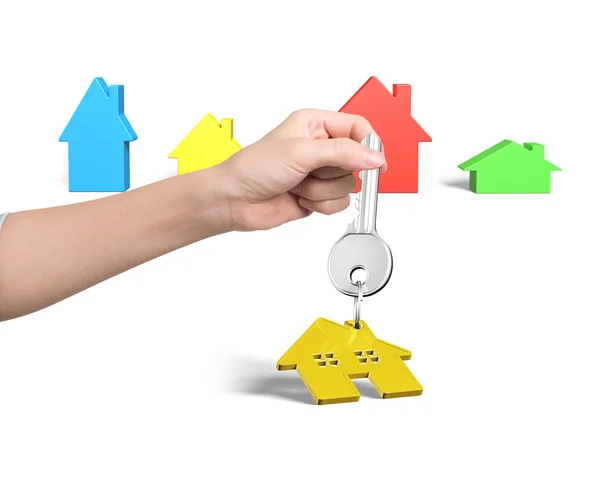 Woman hand holding key with house shape keyring — Stock Photo, Image