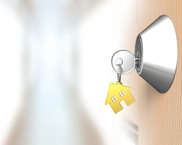 Sleutel met huis vorm sleutelhanger en de deur slot — Stockfoto