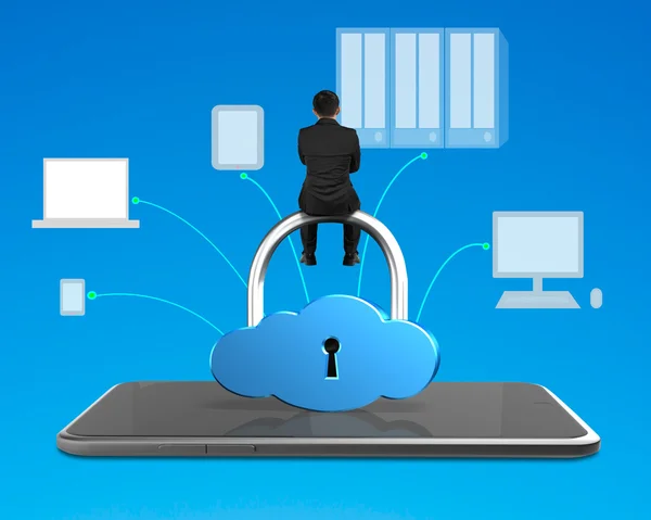 Man sitting on cloud shape lock with smart tablet — Stock Photo, Image