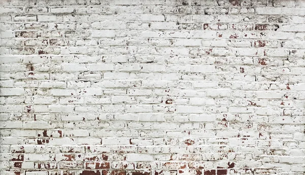 Смугаста цегла червона стіна з фарбою в білому — стокове фото