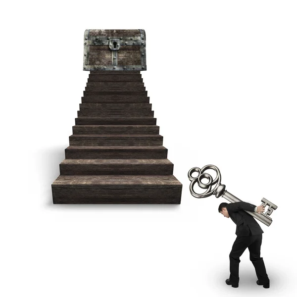 Mannen bär nyckeln mot skattkista på trä trappor — Stockfoto