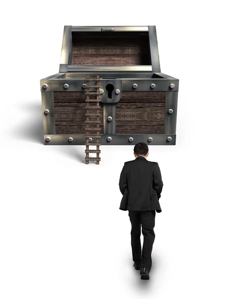 Man walking toward opened treasure chest with wooden ladder — Stock Photo, Image