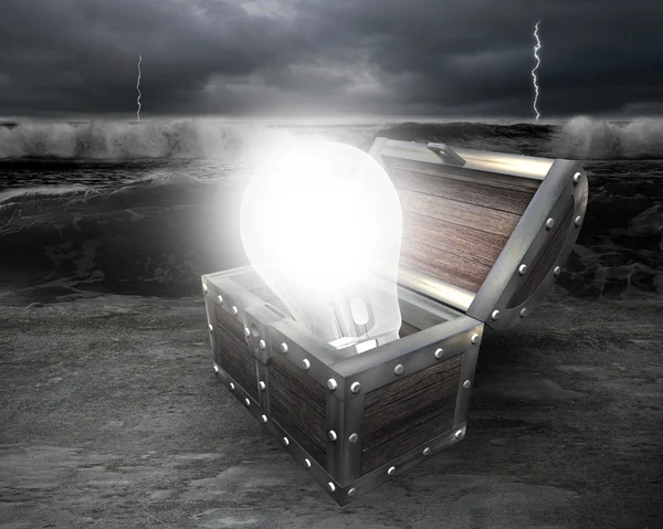 3D bright light bulb in treasure chest — Stock Photo, Image