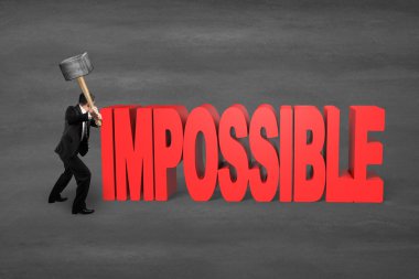 Çekiç tutarak ve imkansız çatlama işadamı