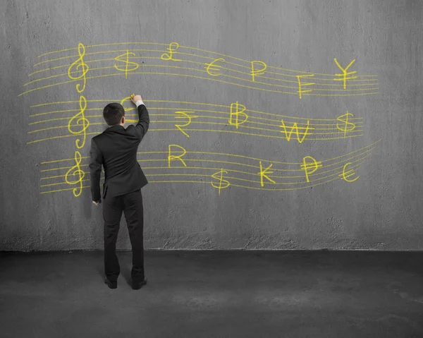 Sketching money stave on concrete wall — Stock Photo, Image